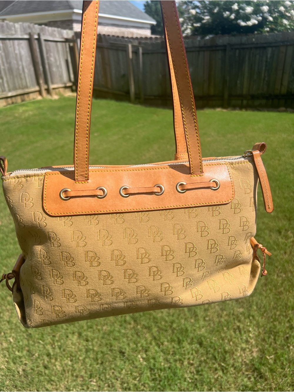Dooney & Bourke DB Tassel Zip Top Tote Sand Tan Canvas Saddle
Tan Leather - Picture 13 of 14
